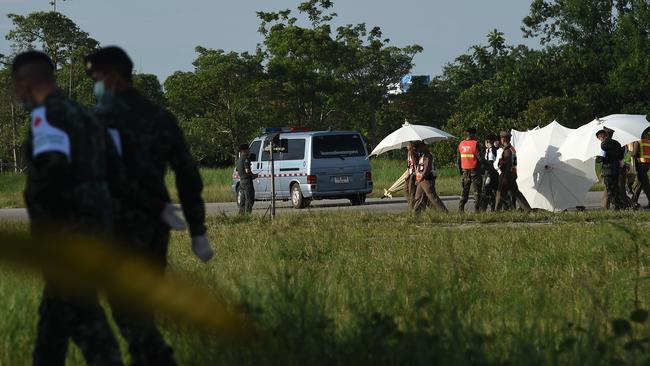 An ambulance leaves the military airport in Chiang Rai. Picture: AFP