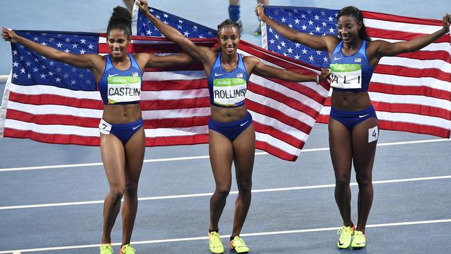 Gold medal winner USA’s Brianna Rollins, centre, silver medal winner Nia Ali, right, and bronze medal winner Kristi Castlin celebrate after the women's 100m hurdles.