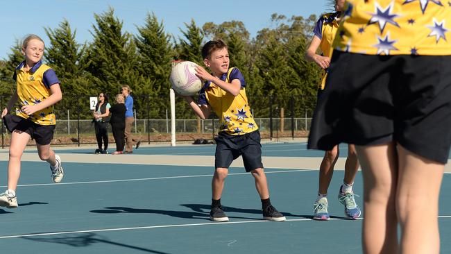 Jack looks to pass the ball at the Macedon Ranges Netball Complex. Picture: David Smith