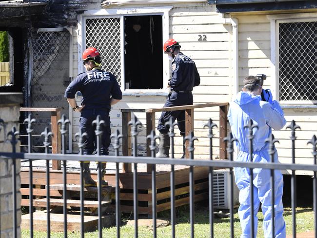 Investigators at the scene of a fatal house fire in Harristown, Wednesday, May 7, 2025. Picture: Kevin Farmer