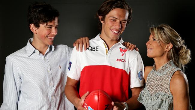 Ollie Florent with his brother, Jai, and mother, Rachael. Picture: Jonathan Ng