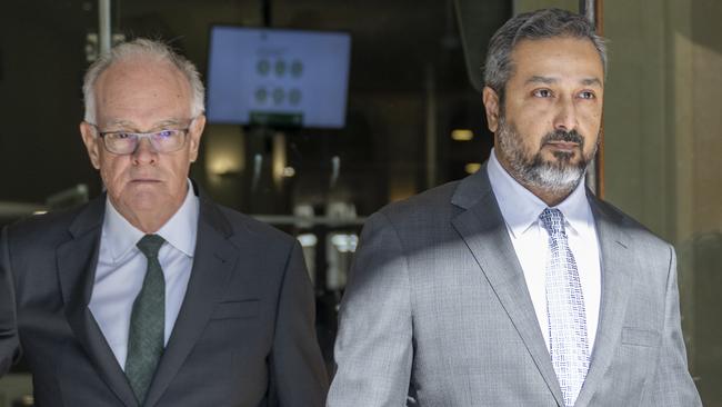 Mohammed Saderuddin Syed (right) pictured walking from Downing Centre with his counsel. Picture: NewsWire / Monique Harmer