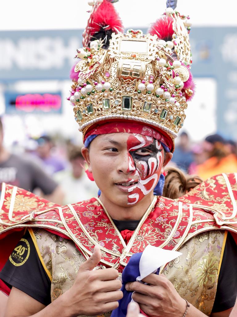 Mitch from Taiwan looking resplendent at the finish line of the Southern Cross University ten kilometre Run. Picture: Tim Marsden.