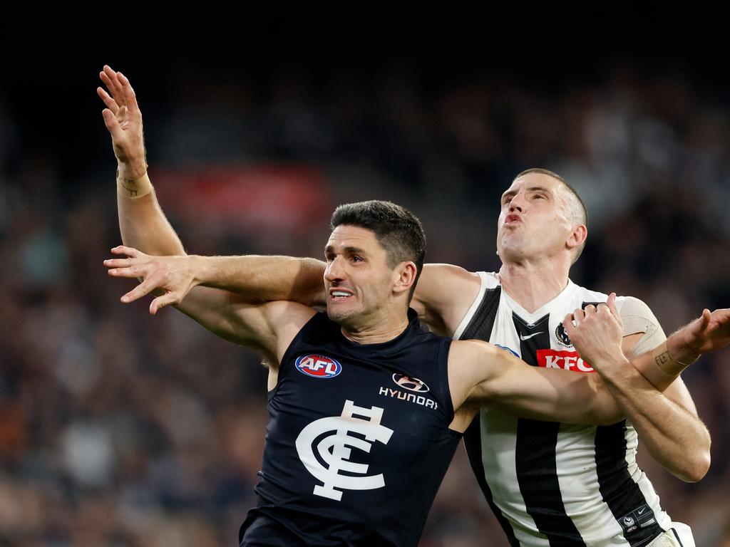 Marc Pittonet and Darcy Cameron jostle for position. Picture: Dylan Burns/AFL Photos via Getty Images