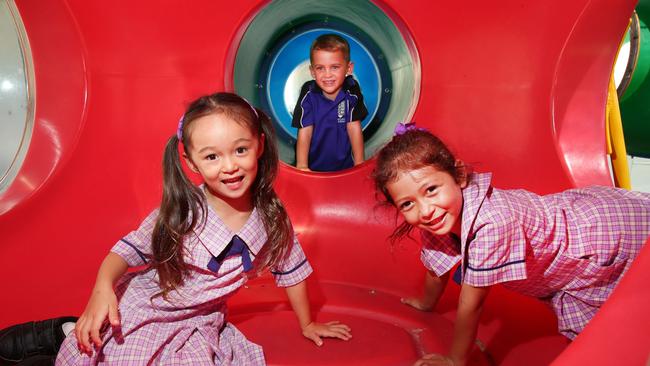 Broadbeach State School Prep Classes for My First Year. Prep in in the playground, from left, Florence, Beau J, Kiana . Picture Glenn Hampson