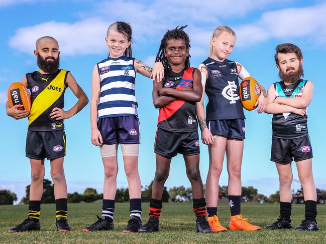 2019 NAB Mini Legends TVC Shoot in Melbourne today.(LtoR) Jake 8yrs (Bachar Houli), Grace 8yrs (Richelle Cranston), Albert 8yrs (Anthony McDonald-Tipungwuti), Alyssa 8yrs (Tayla Harris) and Koby 6yrs (Justin Westhoff).  Picture by Wayne Taylor. 5th July 2019