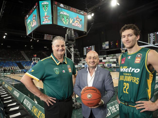 NBL and JackJumpers owner Larry Kestelman (centre), coach Scott Roth and team member Will Magnay at MyState Bank Arena. Picture: Chris Kidd