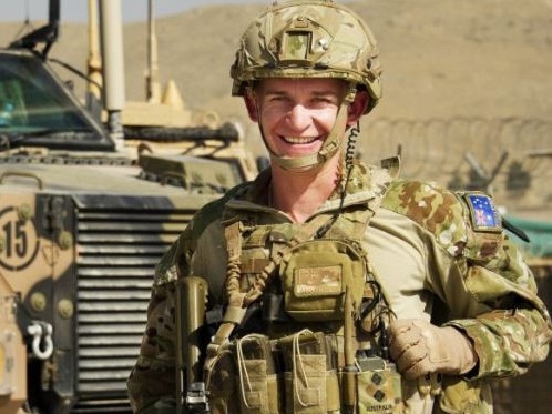 Captain William Michael Howieson, 29, has been charged is accused of exposing his erect penis to a nurse in Papua New Guinea, among other charges. He has pleaded not guilty to three counts of indecency and one count of conduct prejudicing the defence force. He is pictured in 2014 in Kabul, Afghanistan. Picture: ADF/SuppliedID verified in court by reporter Craig Dunlop