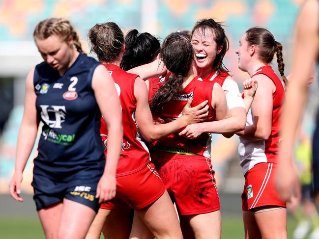 Rachel Archer hugging teammate Melanie Wise after Clarence won the 2019 grand final. Picture: NIKKI DAVIS-JONES