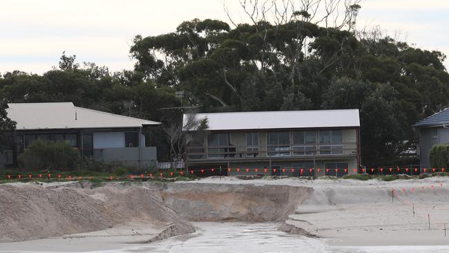 Houses and the access road on Winda Woppa, on the northern side of Nelson Bay, have affected by coastal erosion. Picture by Peter Lorimer.