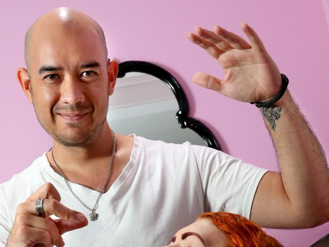 Christopher Phoenix the hypnotist with customer Nikki Parker at the Painted Lady Tattoo, Holland Park - Picture: Richard Walker