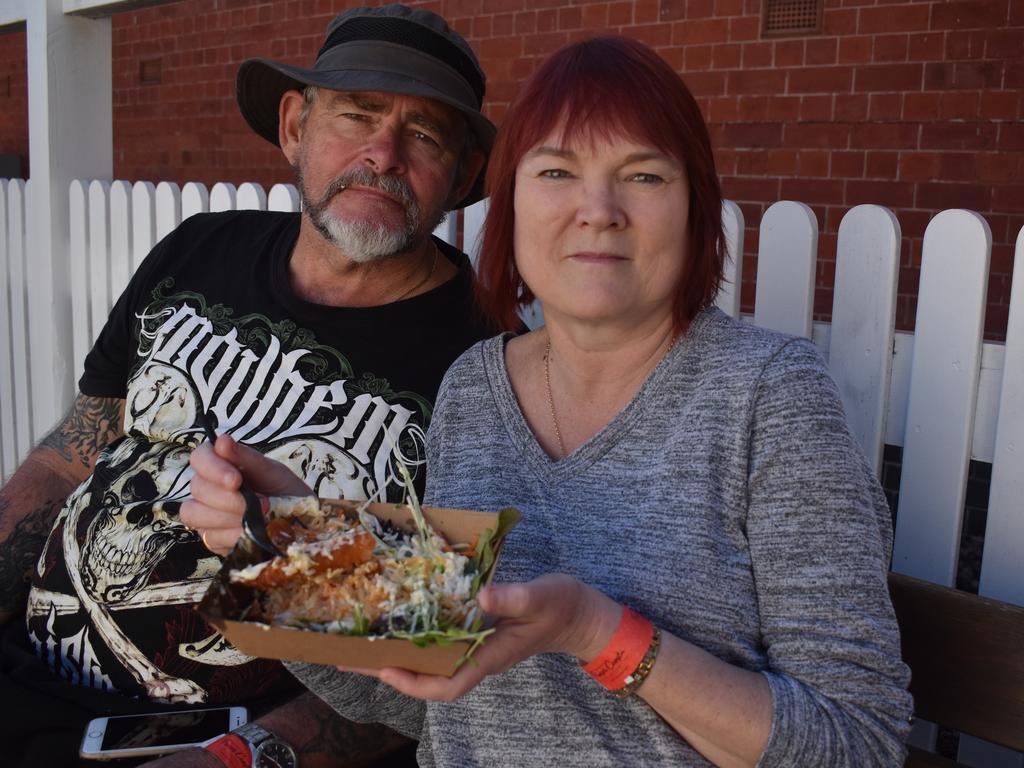 Kevin and Pam Meier from Maryborough enjoy honey garlic prawns at Relish Food and Wine Festival in Maryborough. Photo: Stuart Fast