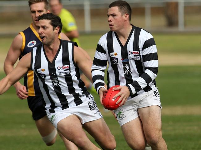 Wallan’s Ricky Schraven looks for an option on Saturday. Picture: Hamish Blair