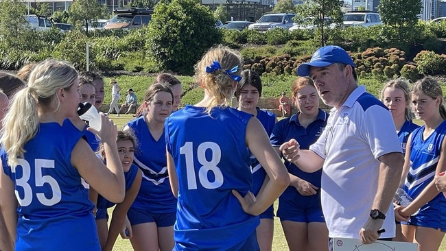 The Brisbane Grammar school senior players listen to their coach earlier in the year. This Saturday will be the junior girls turn to play.