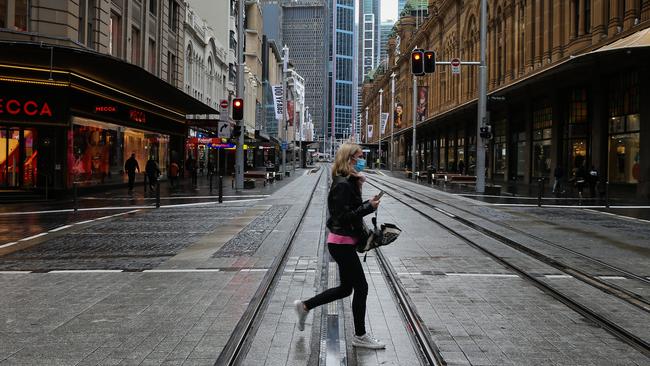 Closed business and quiet streets in the CBD during Sydney’s latest lockdown. Picture: NCA NewsWire / Gaye Gerard