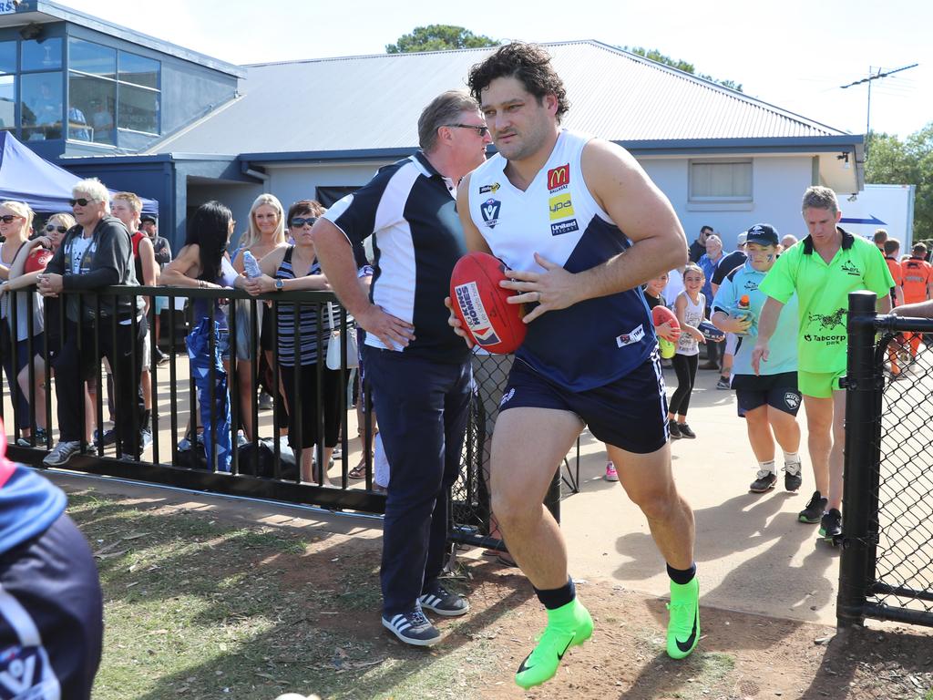 Fevola runs out as playing coach for Melton South last year. Picture: Alex Coppel