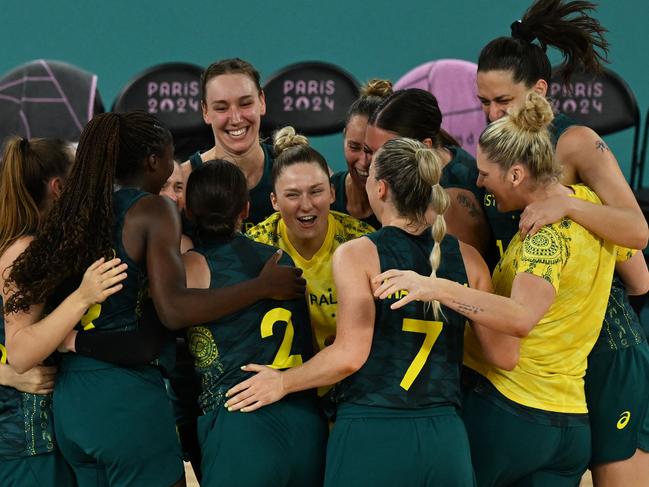 Australia celebrates its bronze medal. Picture: Paul Ellis / AFP