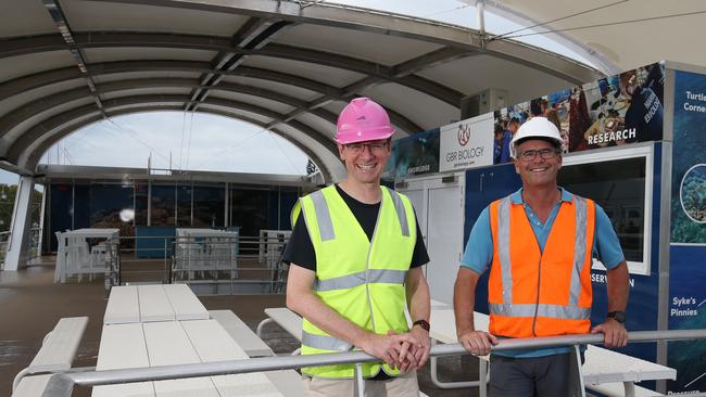 Experience Co CEO John O’Sullivan and General Manager of Great Barrier Reef Adam Jones on the top deck of the 1,000sq m adventure pontoon. Picture: Brendan Radke