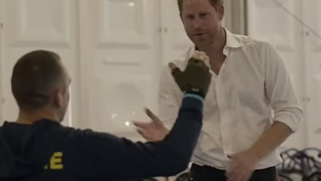 Prince Harry greets a veteran during the trailer for his new Netflix docuseries. Picture: Netflix