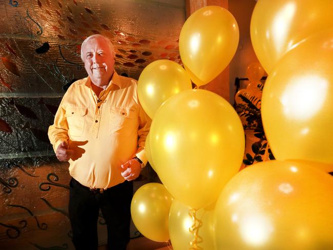 Clive Palmer poses for a post election day photo at his house prior to casting his vote. Picture Scott Powick.