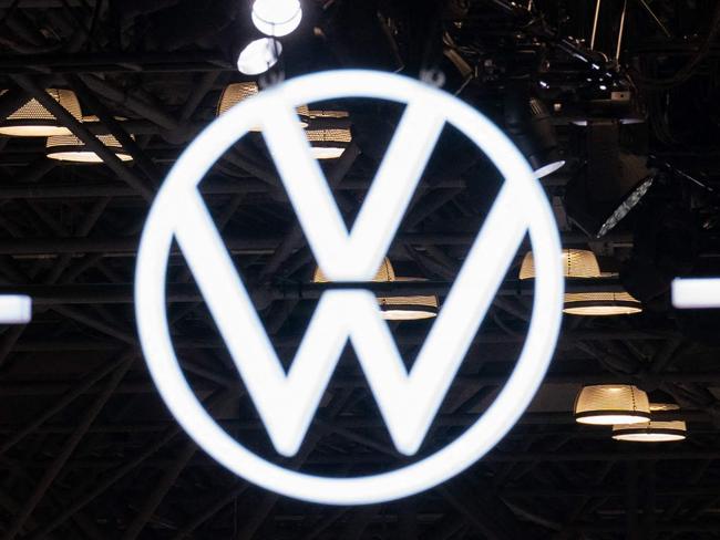 NEW YORK, NEW YORK - APRIL 16: Volkswagen, Toyota and Honda logos hang at the New York International Auto Show on April 16, 2025 in New York City. The New York International Auto Show is celebrating its 125th year anniversary, amidst the background of tariffs on the automotive industry. President Donald Trump indicated the possibility of a temporary suspension of the tariffs.   Adam Gray/Getty Images/AFP (Photo by Adam Gray / GETTY IMAGES NORTH AMERICA / Getty Images via AFP)