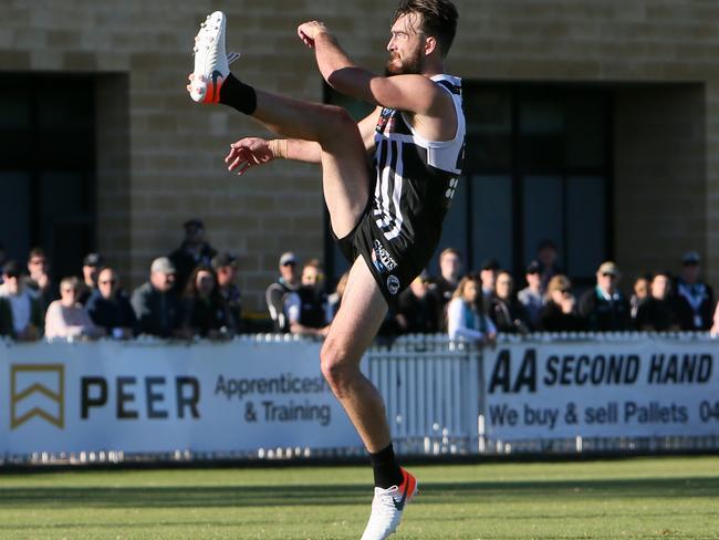 Charlie Dixon lines up for goal during the Port Adelaide v Norwood game on Sunday. Picture: AAP/Emma Brasier