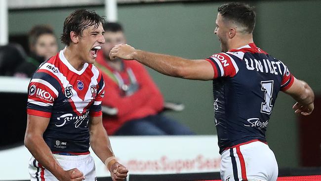 Roosters' Billy Smith celebrates try with James Tedesco during NRL match between the South Sydney Rabbitohs and Sydney Roosters at ANZ Stadium. Picture: Phil Hillyard