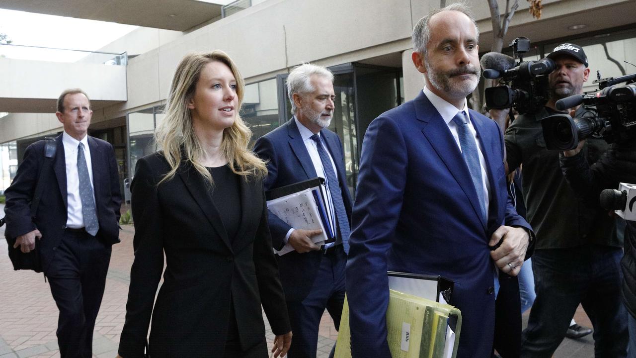 Former Theranos CEO Elizabeth Holmes and lawyer Kevin Downey (second right) leave a federal court after a status hearing on July 17, 2019 in San Jose, California. Picture: Kimberly White/Getty Images/AFP
