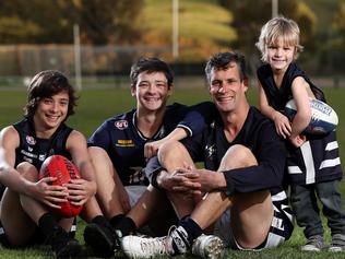 24/06/16 Jason Peach has played his 400th game for the Noarlunga Football Club. Jason with his kids Hayden, Jesse and Harry. photo Calum Robertson