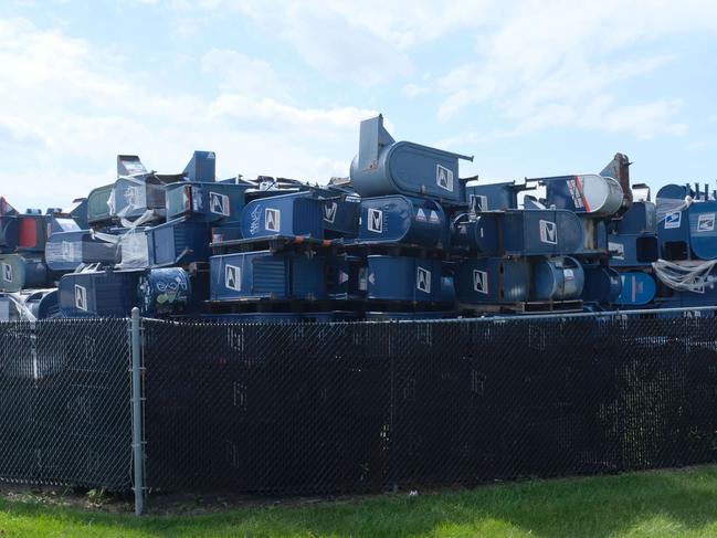 HARTFORD, WISCONSIN - AUGUST 17: Mailboxes from across the country are stored outside of Hartford Finishing Inc. where they will be refurbished or repaired on August 17, 2020 in Hartford, Wisconsin. A viral photo of the mailboxes has been misused on social media as evidence of the Trump administration tampering with the United States Postal Service ahead of November's election.   Alex Wroblewski/Getty Images/AFP == FOR NEWSPAPERS, INTERNET, TELCOS & TELEVISION USE ONLY ==