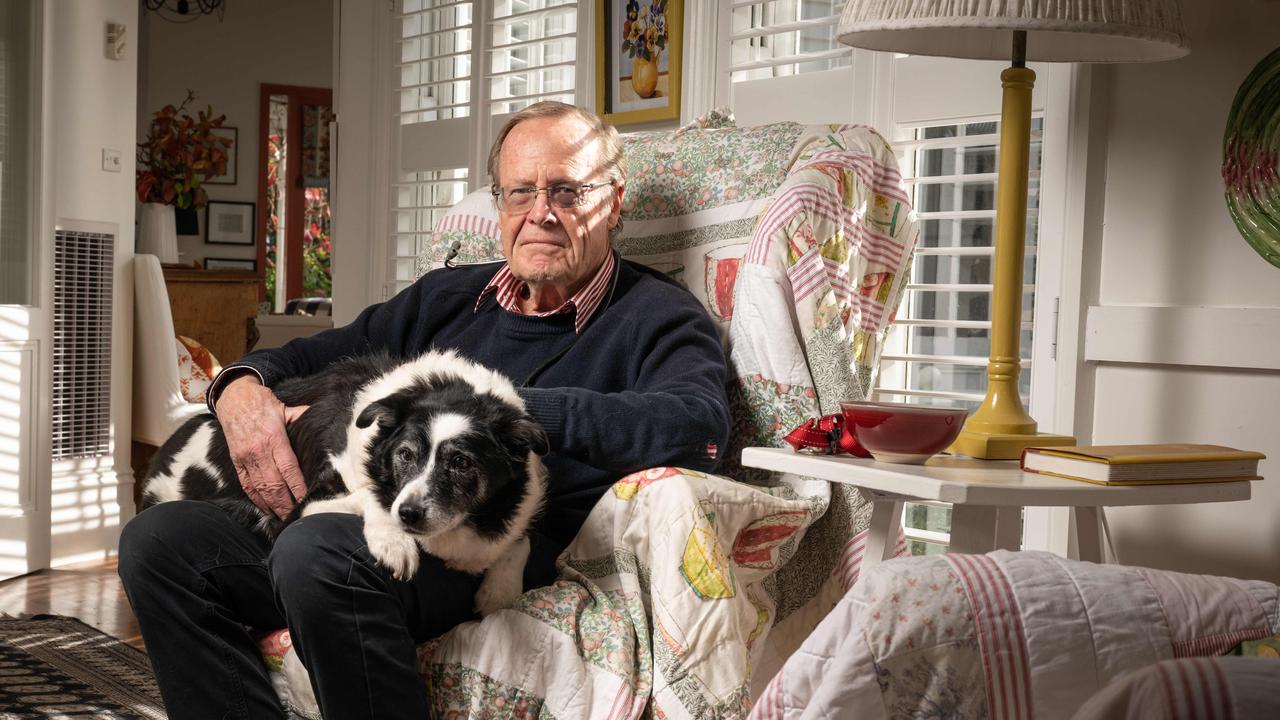 Dr Jack Ayerbe has received a King's Birthday award for services to veterinary science. Pictured with his neighbours dog Dash who he has treated. Picture: Brad Fleet