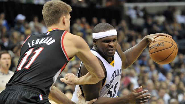 Memphis Grizzlies forward Zach Randolph drives around Portland Trail Blazers centre Meyers Leonard.