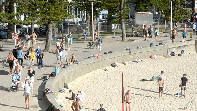 Manly Beach was busy today, April 24, 2020, despite social distancing restrictions. Picture: Jeremy Piper