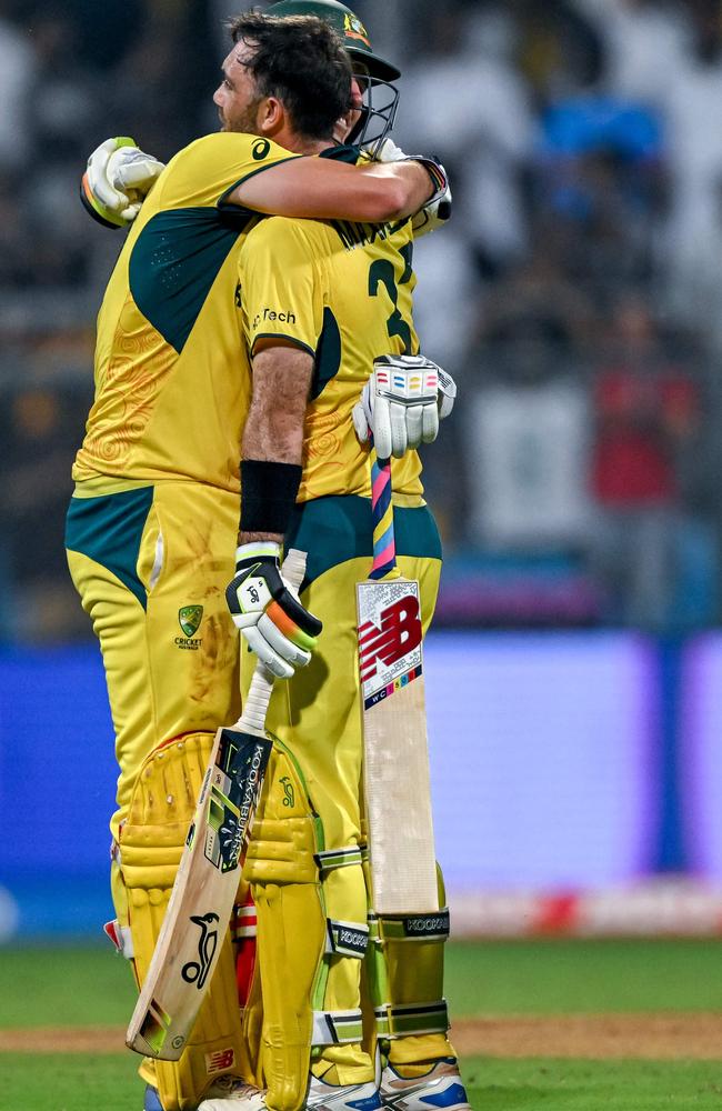 An Australian hero - and Glenn Mazwell. Photo by INDRANIL MUKHERJEE / AFP.