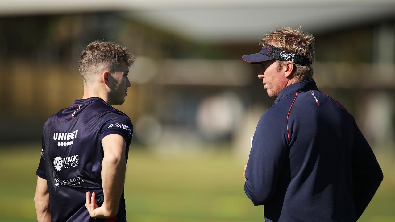 Sam Walker talks shop to Roosters coach Trent Robinson. Picture: Matt King/Getty