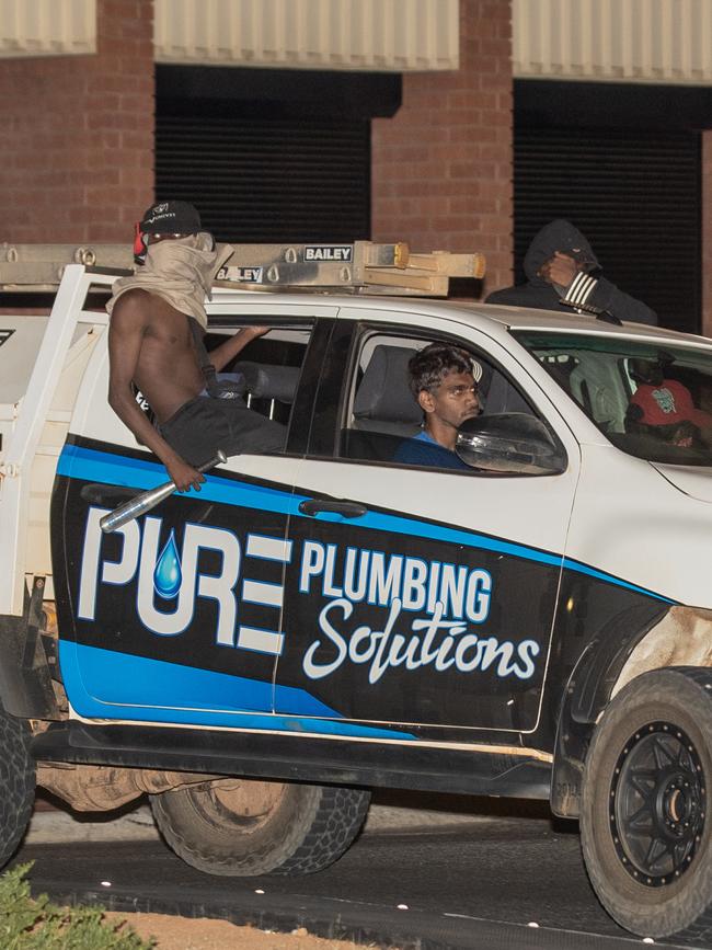 Youths in Alice Springs drive a stolen Toyota Hilux through town at 4am. Picture: Liam Mendes