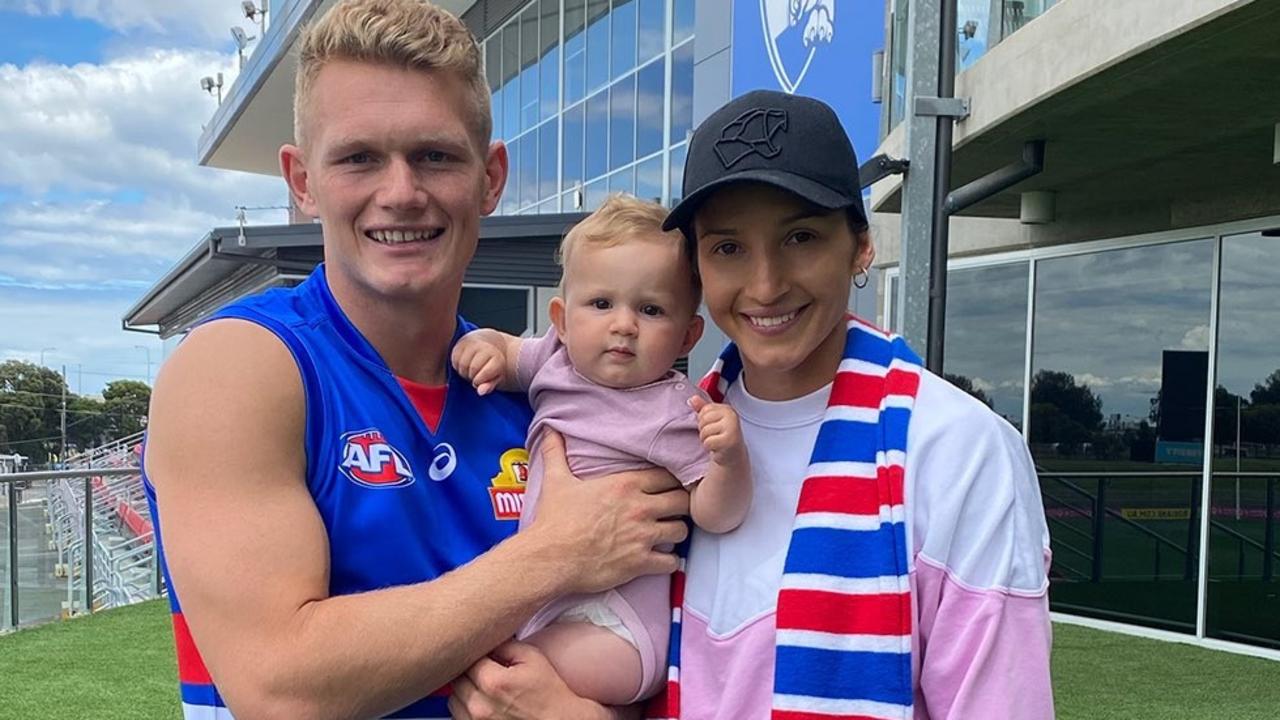 Treloar and fiance Kim Ravallion and daughter Georgie at the home of the Western Bulldogs