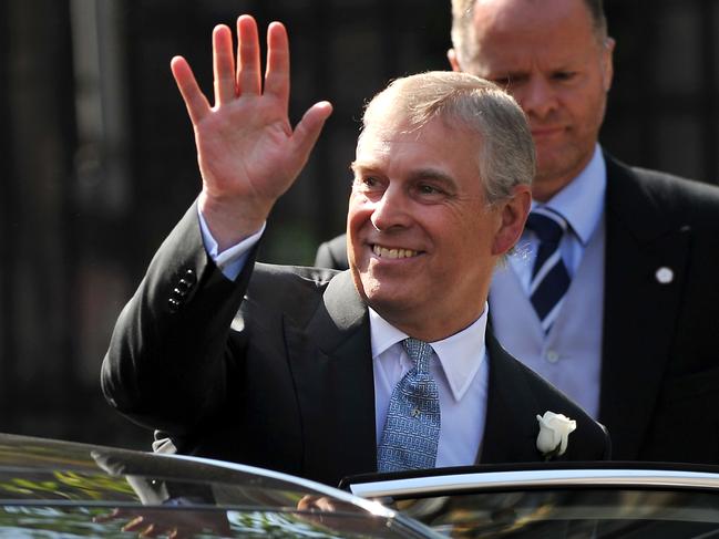 (FILES) In this file photo taken on July 30, 2011 Britain's Prince Andrew leaves after attending the wedding of Zara Phillips, granddaughter of Britain's Queen Elizabeth II, and England rugby player Mike Tindall at Canongate Kirk in Edinburgh, Scotland. - Prince Andrew on November 20, 2019 said he was cancelling his public engagements, as the outcry from the British royal's friendship with convicted sex offender Jeffrey Epstein showed no sign of abating. (Photo by Ben STANSALL / AFP)