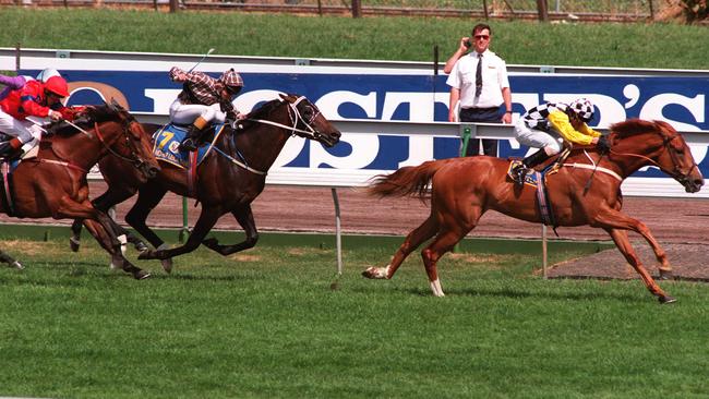 Darren Beadman urges Saintly clear of the field to win the 1996 Melbourne Cup.