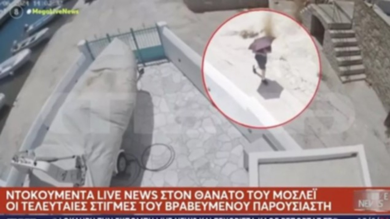 Police have released CCTV footage showing Dr Michael Mosley walking past a property with an umbrella on the Greek island of Symi, shortly before his death. Picture: Mega TV