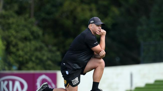 Coach Anthony Seibold takes a knee during traing, Brisbane Broncos training, Red Hill. Photographer: Liam Kidston.