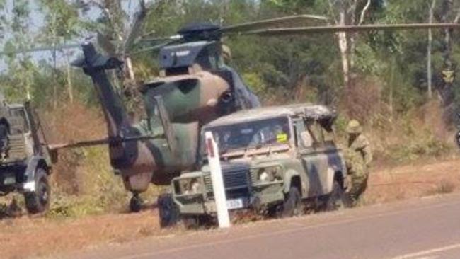 It was a case of grounded tiger, hidden fault when an Army attack helicopter made an emergency landing in the rural area on Tuesday. Top End local John Korn was driving towards the new prison at Howard Springs around 2.30pm when he spotted an Australian Army ARH Tiger on the side of the road. Picture: John Korn