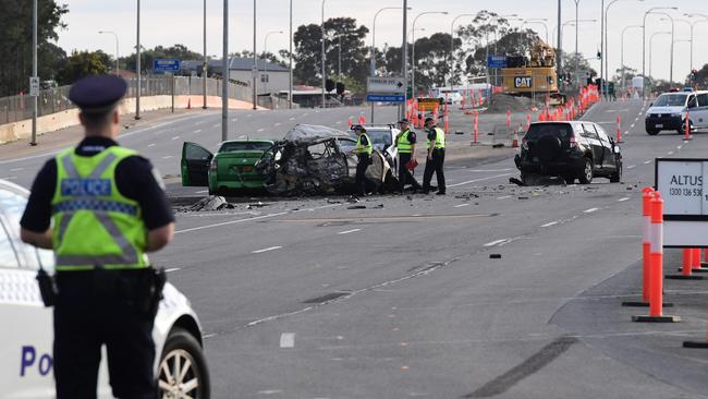 Police at the horrific accident scene on Main South Rd, Bedford Park. Picture: Campbell Brodie