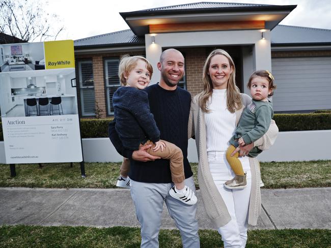 Justin and Rebecca Falzon, with kids Samuel and Eileen, are selling their Camomile St home in The Ponds via auction. Picture: Sam Ruttyn