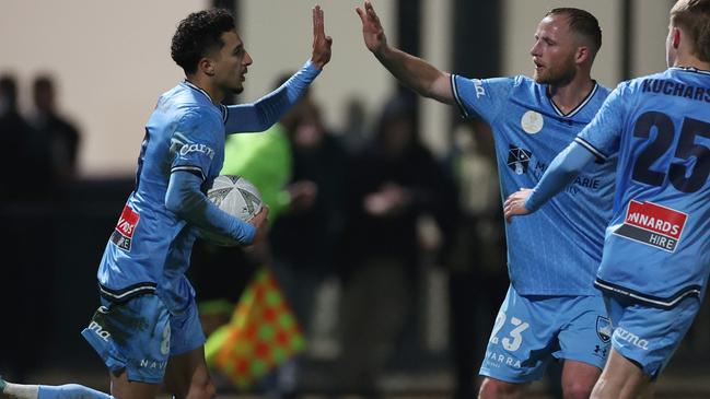 Anas Ouahim celebrates a goal with Rhyan Grant. Picture: Daniel Pockett