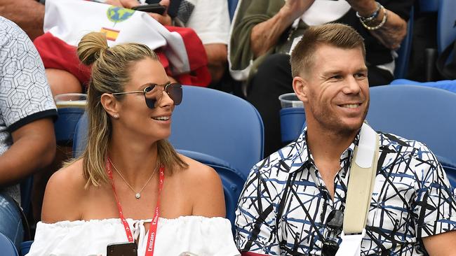 David Warner (R) credits partner Candice (L) with being his rock throughout the year-long ban. Picture: AAP