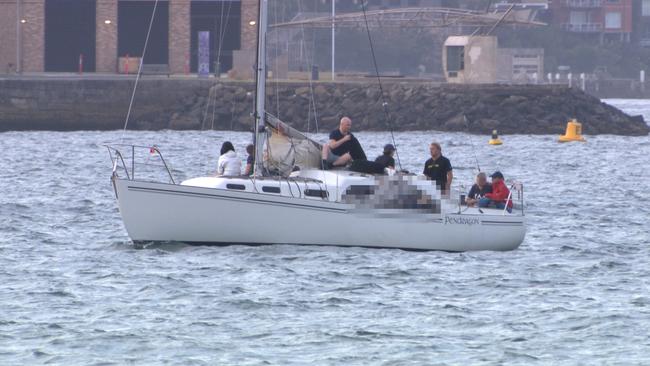 The Plato Pendragon returning to the Cruising Yacht Club of Australia following the tragedy. Picture: OnScene Bondi