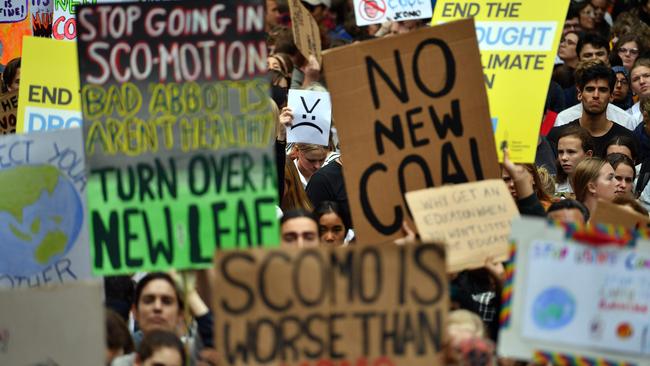 Around the world on March 15, students, including these in Sydney, marched in a strike and protest to highlight inadequate progress in addressing climate change. Picture: Saeed Khan/AFP