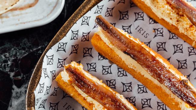 So simple, so delicious: Cantabrian Anchovies on Tomato Migas Bread with Creme Fraiche.