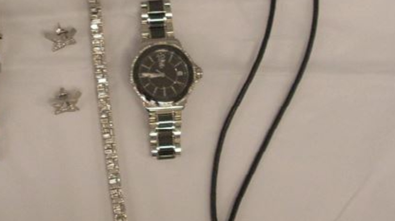 Designer watch, earrings and bracelet.
